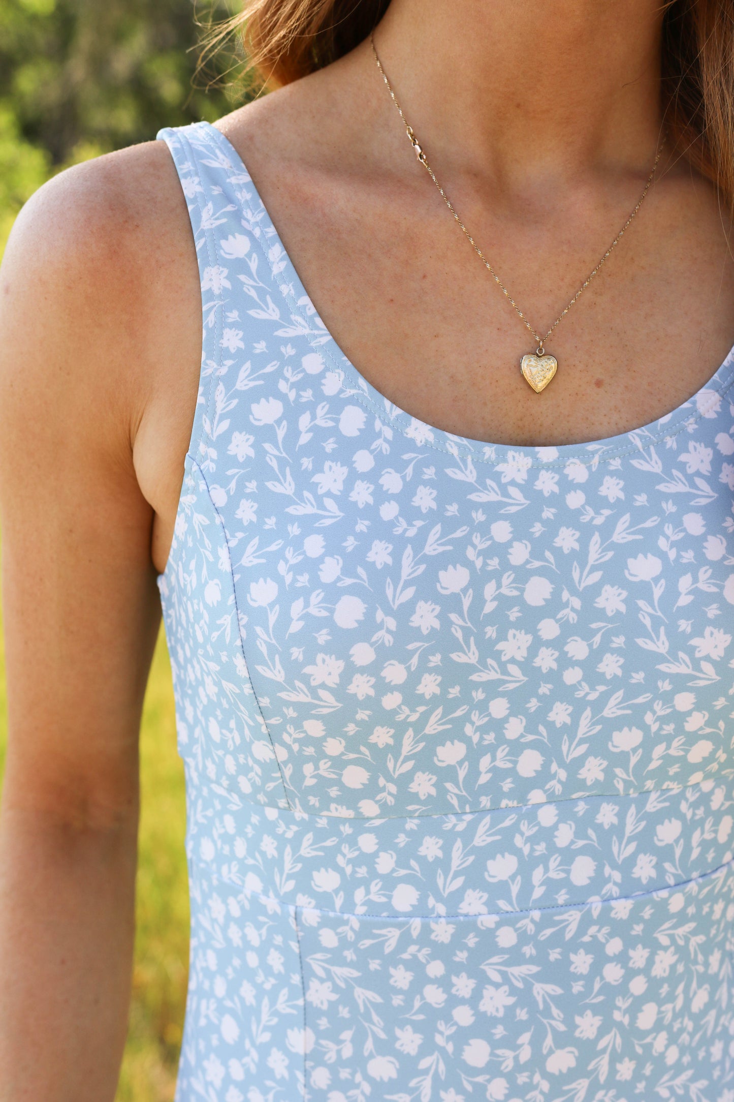 Detail shot of the 2-inch underbust support band on the Sophie One Piece, offering sports-bra style support.